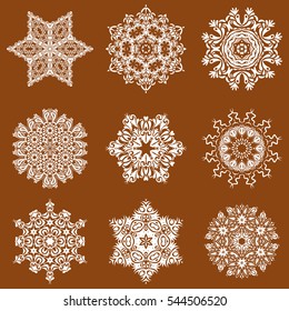 Vector Christmas Abstract Stylized Snowflakes Set on a brown Background.