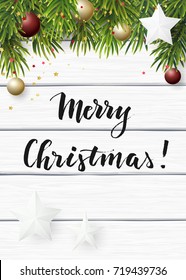 Vector Christmas background with green fir branches, white paper stars and cristmas balls on a white wooden background.