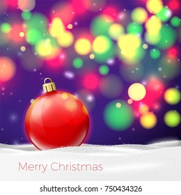Vector Christmas Banner template with bright ball in snow on background with blurred xmas tree.