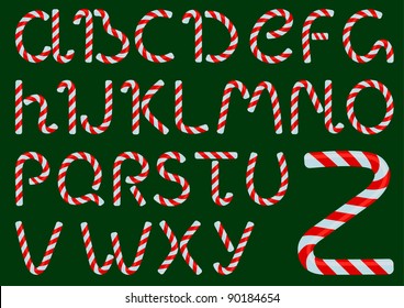 Vector Christmas candles alphabet on a green background