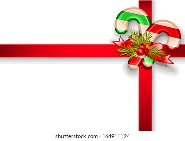 vector Christmas candy canes over the red ribbon and bow
