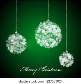 Vector Christmas card with lights on green background