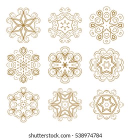 Vector Christmas golden snowflakes set on a white background