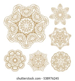 Vector Christmas golden snowflakes set on a white background