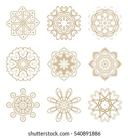 Vector Christmas golden snowflakes set on a white background