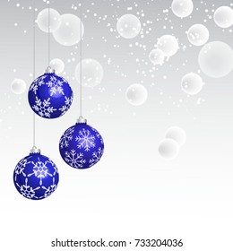 Vector christmas greeting card with blue decorative balls on silver background. Space for  text. 
