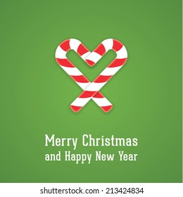 Vector Christmas illustration. Christmas candy on green background. Stylized heart.