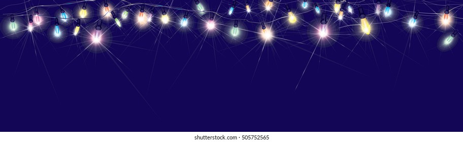 Vector Christmas lights on blue background.