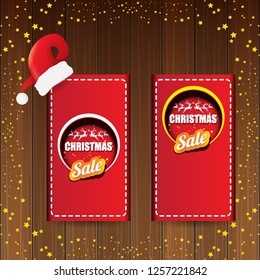 vector Christmas sales banner or tag label with red santa hat on wooden background with stars. Red winter Christmas sale poster design template or background - Vector