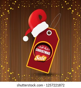 vector Christmas sales banner or tag label with red santa hat on wooden background with stars. Red winter Christmas sale poster design template or background - Vector