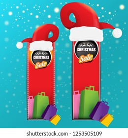vector Christmas sales paper banner or tag label with red santa hat on snowy azure background with falling snowflakes. Red winter Christmas sale poster design template or background