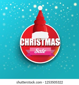 vector Christmas sales paper banner or tag label with red santa hat on snowy azure background with falling snowflakes. Red winter Christmas sale poster design template or background