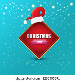 vector Christmas sales paper banner or tag label with red santa hat on snowy azure background with falling snowflakes. Red winter Christmas sale poster design template or background