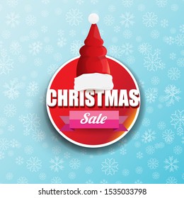 vector Christmas sales paper banner or tag label with red santa hat on snowy blue background with falling snowflakes. Red winter Christmas sale poster design template or background