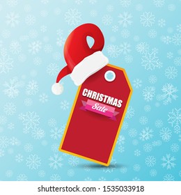 vector Christmas sales paper banner or tag label with red santa hat on snowy blue background with falling snowflakes. Red winter Christmas sale poster design template or background