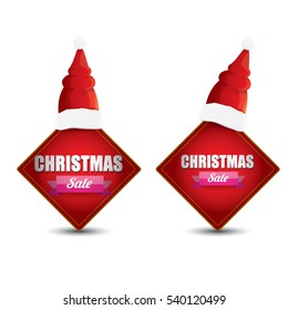 vector Christmas sales tag or label with red santa hat isolated on white background. Red winter Christmas sale poster or background