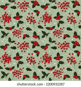 Vector Christmas seamless pattern with bunches of red berries, holly on a light green background. Suitable for greeting cards, wrapping paper.