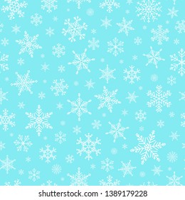 Vector Christmas seamless pattern. Cute background with white snowflakes in different shapes and forms. Many cold flake elements on blue background, Xmas concept. Snow flakes illustration, snowfall.