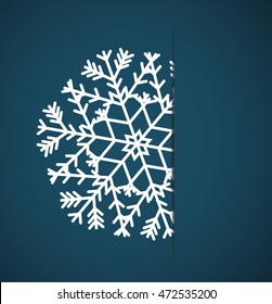 Vector Christmas snowflake applique in paper card on a blue background