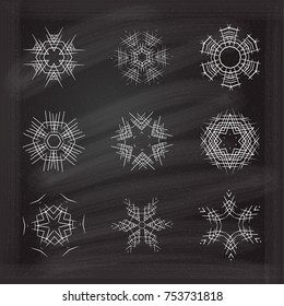 Vector Christmas snowflake set on a chalkboard background.