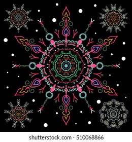 Vector Christmas Stylized green and magenta Snowflakes Set on a Black Background.