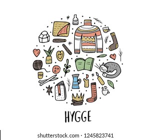 Vector circle composition of Hygge sings. Vector isolated symbols of comfort. Round badge of warm clothes and cozy home things.