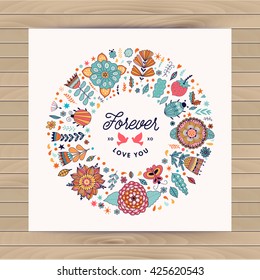 Vector circle frame, wreath made of flowers.  Circle decoration. Wreath illustration made of flowers and herbs. Spring elements. Floral doodles wreath. Forever love you
