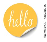 Vector circle sticker with curled corner and hello text inside.