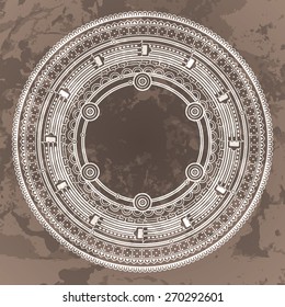 Vector circular pattern in the style of the Aztec calendar stone on a brown grunged background
