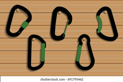 Vector Climbing carabiners set on wooden background