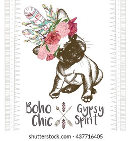 Vector close up portrait of french bulldog puppy, wearing the indian feather headpiece. Hand drawn domestic dog illustration. Traditional boho chic decoration, with aztec arrows, feather and flowers.