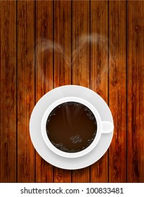 Vector coffee cup on wooden background with smoke in the form of heart. Eps10