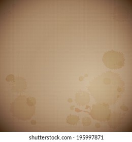 Vector coffee stains on dark textured paper.