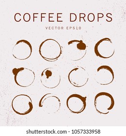 Vector collection of artistc round hand made coffee stains isoalted on textured background. Perfect for coffee shop packaging design, emblems, insignia, etc. 