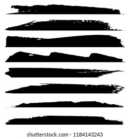 Vector collection of artistic grungy black paint hand made creative brush stroke set isolated on white background. A group of abstract grunge sketches for design education or graphic art decoration