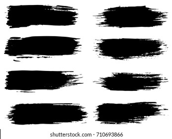 Vector collection of artistic grungy black paint hand made creative brush stroke set isolated on white background. A group of abstract grunge sketches for design education or graphic art decoration