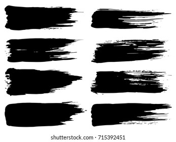 Vector collection of artistic grungy black paint hand made creative brush stroke set isolated on white background. A group of abstract grunge sketches for design education or graphic art decoration