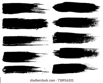 Vector collection of artistic grungy black paint hand made creative brush stroke set isolated on white background. A group of abstract grunge sketches for design education or graphic art decoration