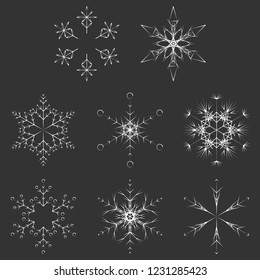 Vector collection of artistic icy abstract crystal snow flakes isolated on background as winter december decoration group or collection. Ice or frost beautiful star ornament silhouette or season art