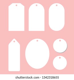 Vector collection of blank Christmas gift tags and badges templates different shapes isolated on color background. Emblems for xmas holiday presents packaging. Good for New year congratulations.