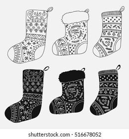 Vector collection of Christmas stockings. Stylized winter black and white socks. Set of decorative Christmas stockings with ornaments. Merry Christmas.