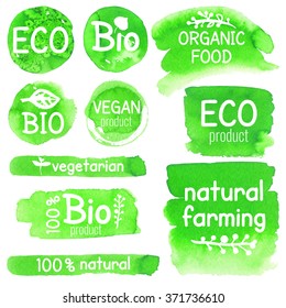 vector collection of eco, bio, vegan product, natural farming, organic food, vegetarian, 100% natural labels for organic and natural product, hand drawn watercolor stains set with leaves