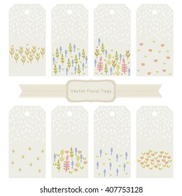 Vector collection of floral tags on grey background.