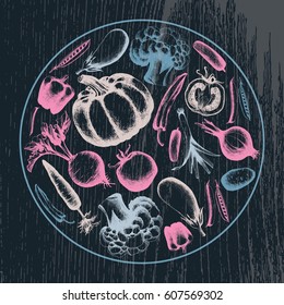 Vector collection of fresh vegetables in the form of isolated colored silhouettes on a dark background. Vegetarian food collected in a circle.