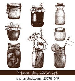  Vector collection of ink hand drawn mason jars. Vintage decorative glass canning jars with flower, fruits, jam isolated on white background. Wedding or holiday design.