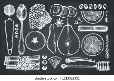 Vector collection of kitchen herbs, spices, dried fruits and berries. Hand sketched ingredients for winter food and hot drinks. Christmas menu design elements on chalkboard.