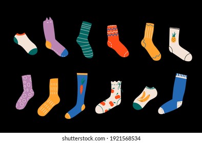 Vector collection of modern stylish cotton and woolen socks with different colored textures. Funny apparel illustration. Clothing design elements set. Items bundle on a dark background
