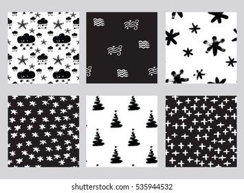 Vector collection of seamless hand drawn patterns. Winter weather theme. Made with ink. Set of black and white patterns for fabric, polygraphy, web, game design.