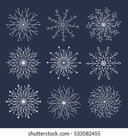 Vector collection of snowflakes, black icon on a dark background