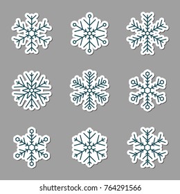 Vector collection of snowflakes icons. Icons on a grey background